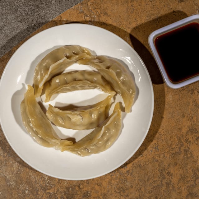 A8-Steamed Dumplings.