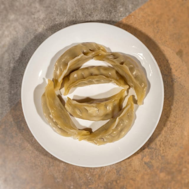 A8-Steamed Dumplings.